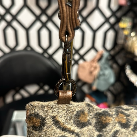 A Vegan animal print clutch with a shoulder strap - Picture 4 of 11